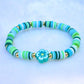 Kilee’s Gold & Teal Flower Clay Bracelet