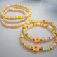 Kilee’s Gold & Orange Flower Clay Bracelet